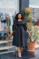 Elegant black midi dress